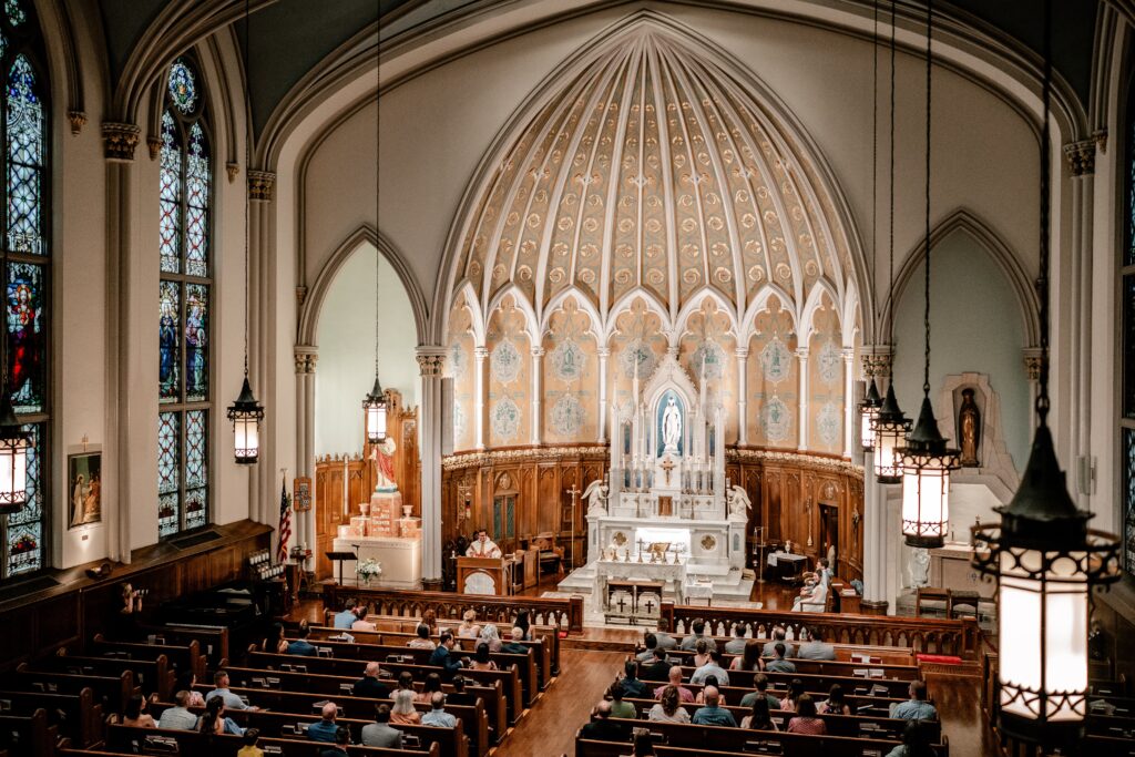 The view from the choir loft of a wedding at Immaculate Conception Church in DC