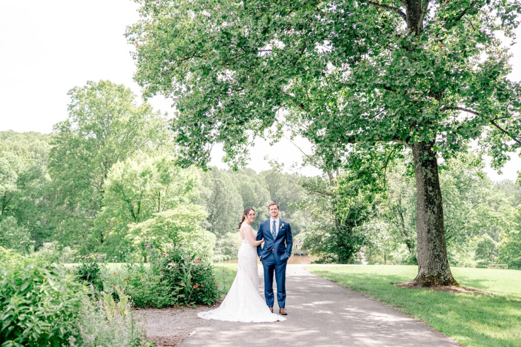 A bride and groom pose for a classic portrait during their Meadowlark Botanical Gardens wedding
