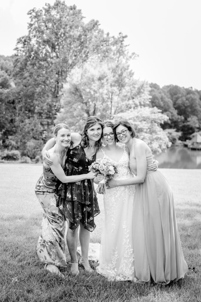 A bride with her bridesmaids during her Meadowlark Botanical Gardens wedding