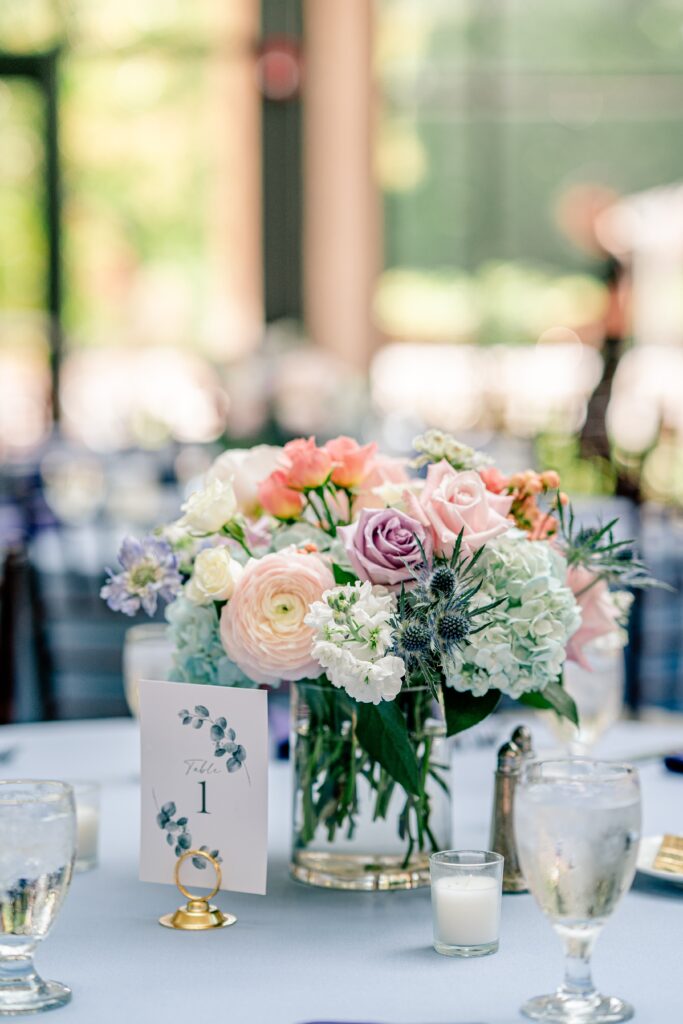 A colorful spring floral arrangement for a wedding reception