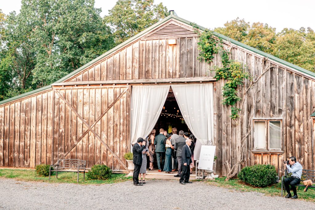 Guests entering the barn for a reception during a Loudoun County wedding