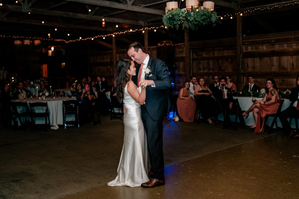 A bride and groom sharing their first dance during their Murray Hill wedding reception