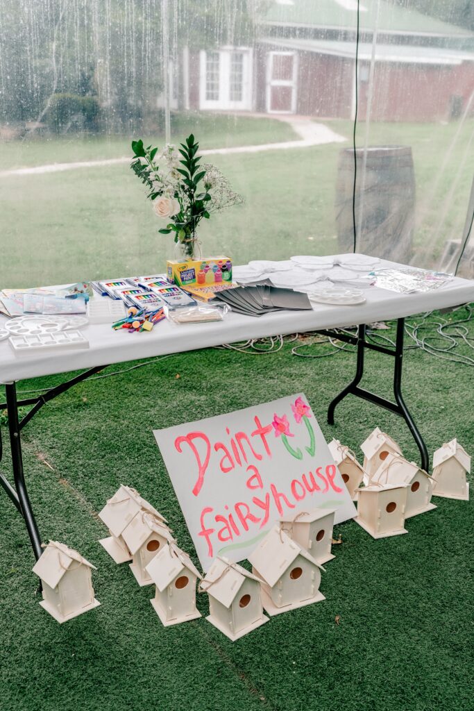 A table full of craft supplies for kids at a Stone Manor Boutique Inn wedding