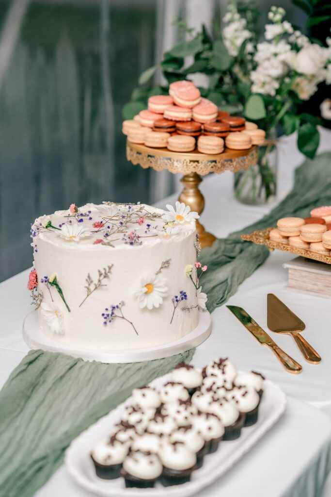 A Stone Manor Boutique Inn wedding cake with macaroons