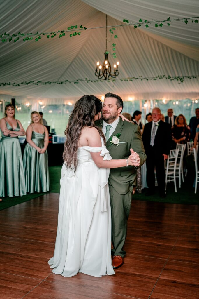A bride and groom sharing their first dance during their Stone Manor Boutique Inn wedding