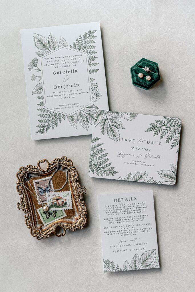 An invitation suite and pearl bridal details for an Atrium at Meadowlark wedding