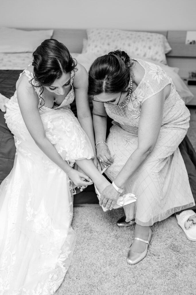 A bride and her mom getting ready before an Atrium at Meadowlark wedding