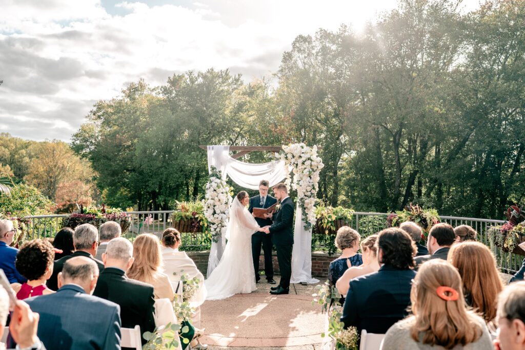 A stunning golden hour wedding ceremony photographed by a Northern VA wedding photographer