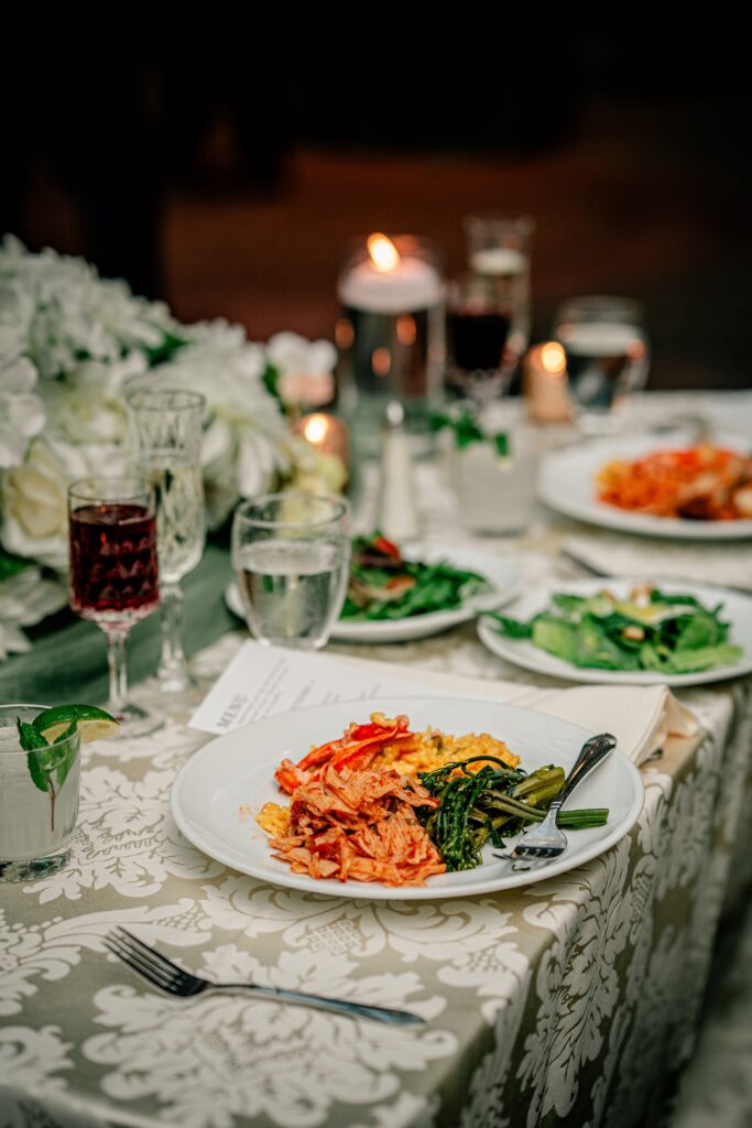 Plates of food for a wedding reception with a Northern VA wedding photographer