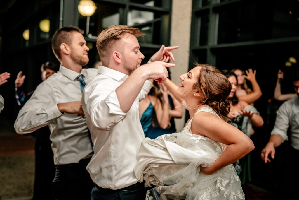 A bride and groom on the dance floor during their Atrium at Meadowlark wedding