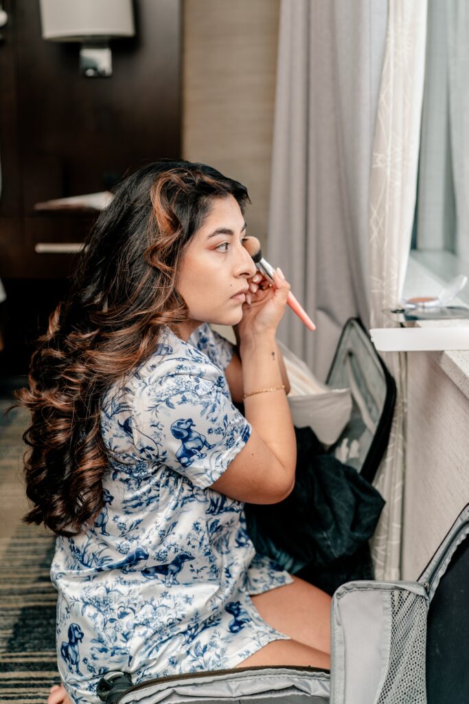 A bride getting ready in her hotel room