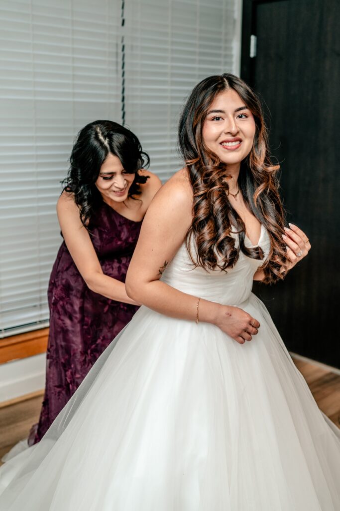 A bride getting ready for her Atrium at Meadowlark indoor wedding
