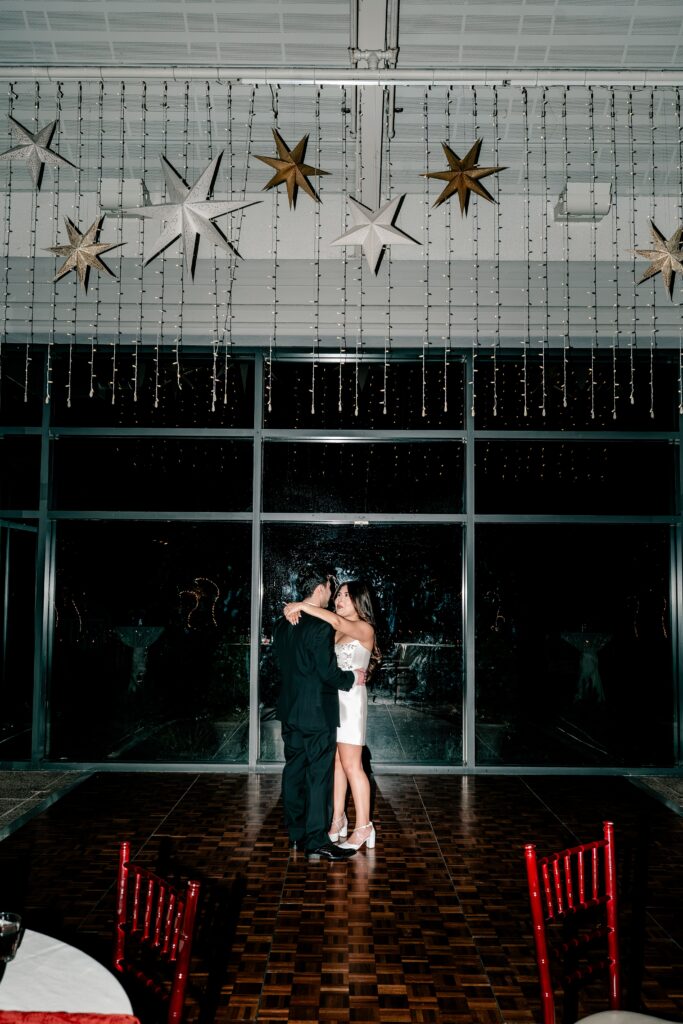 A private last dance for the newlyweds under star decorations