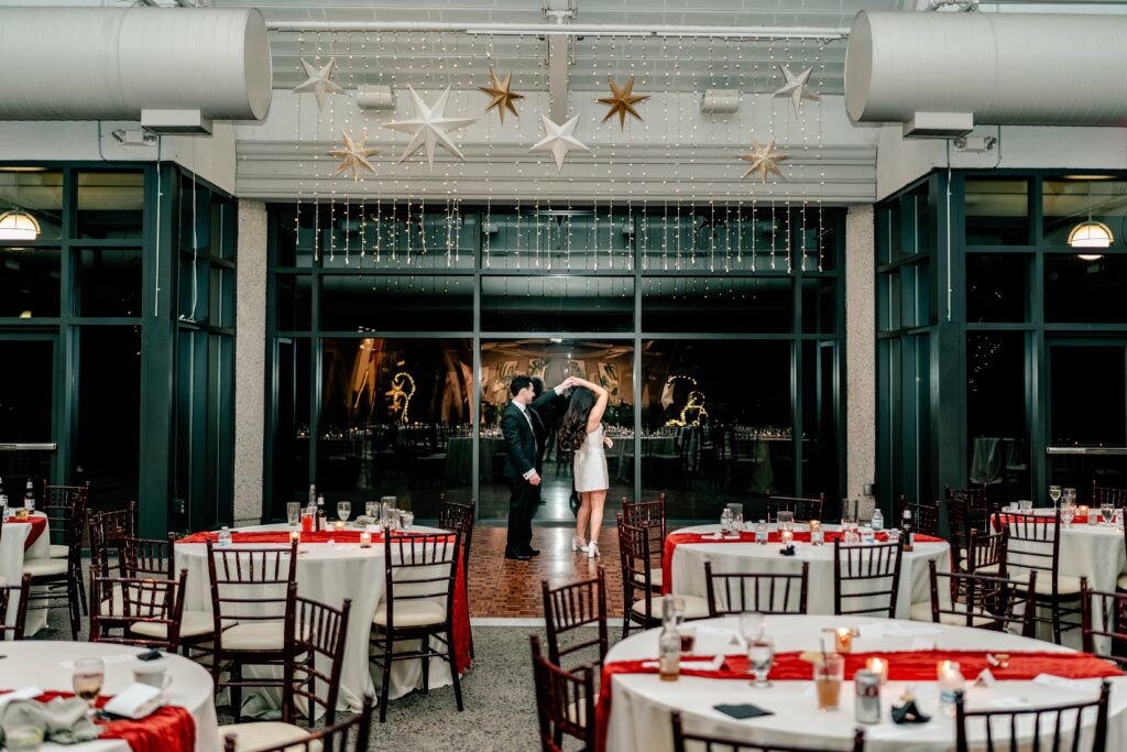 The bride and groom twirl during their private last dance with their Northern VA wedding photographer