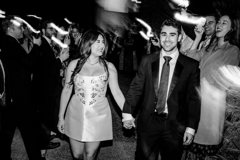A Northern VA wedding photographer captured the bride and groom's flashlight sendoff