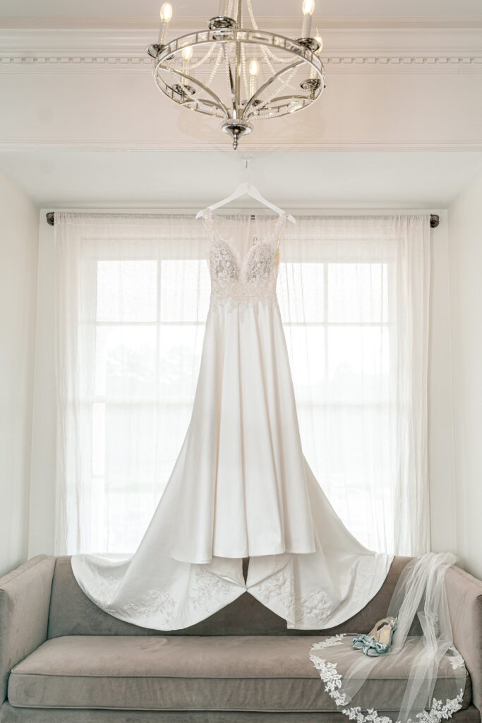 A dress hanging for a The Estate at Independence wedding