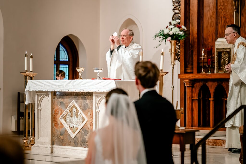 a Catholic wedding Consecration over the bride and groom