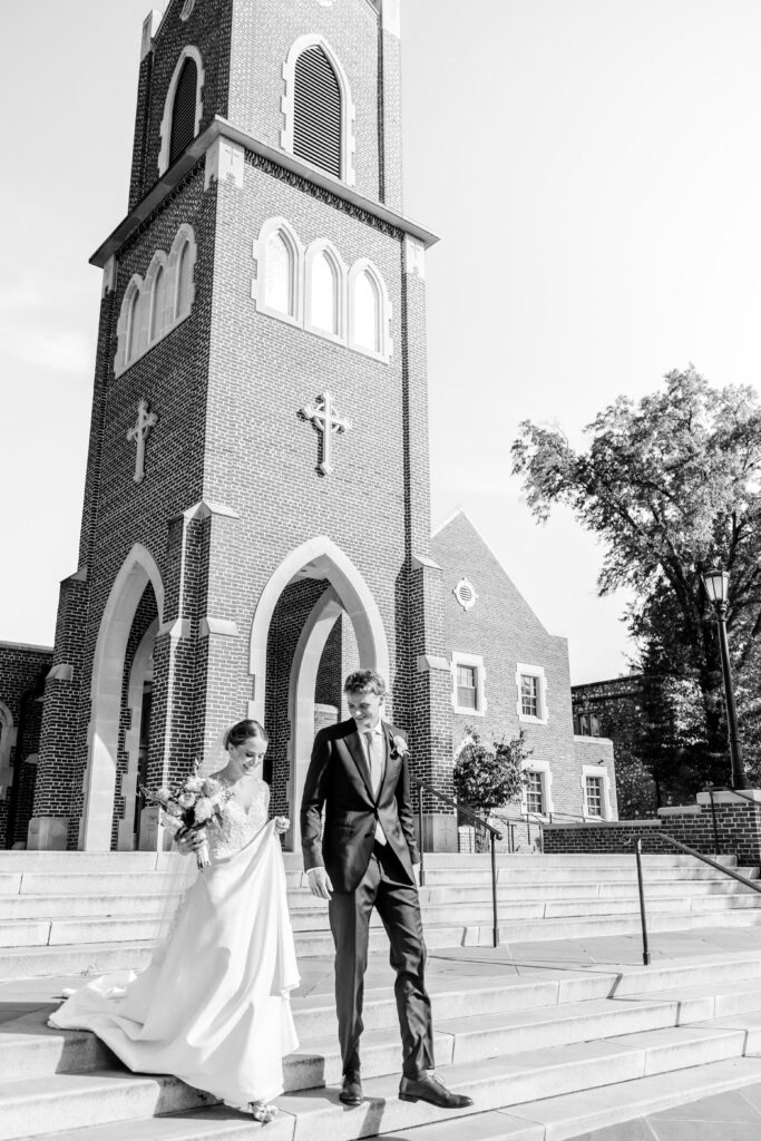 A bride and groom exiting their church ceremony with their Catholic wedding photographer