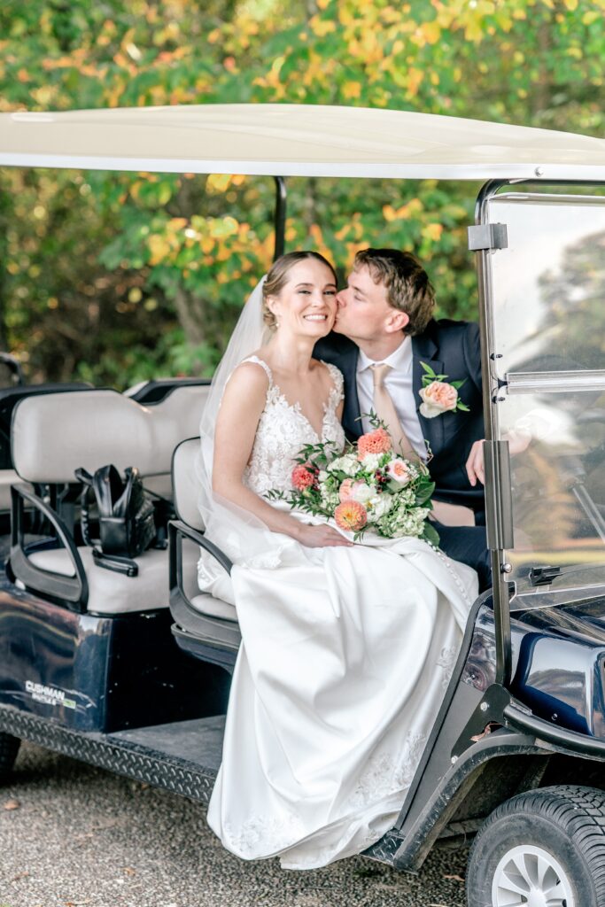 A Richmond wedding photographer captures the groom kissing his bride on the cheek