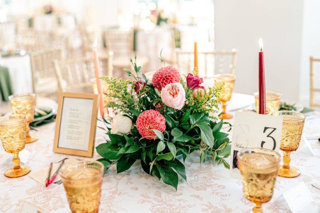 The Estate at Independence wedding reception centerpieces with pink flowers