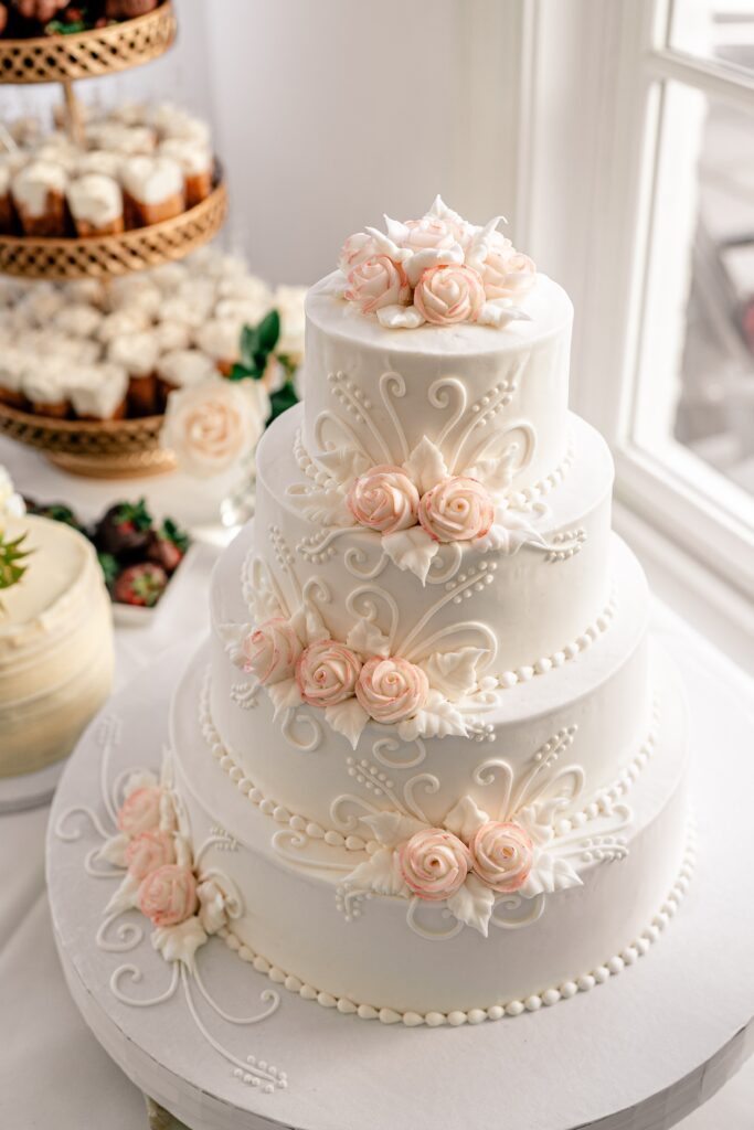 A classic wedding cake captured by a Catholic wedding photographer