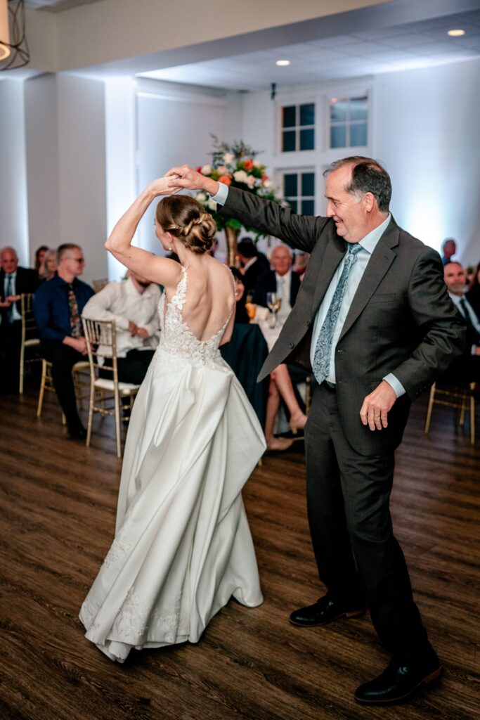 A father daughter dance at a The Estate at Independence wedding reception