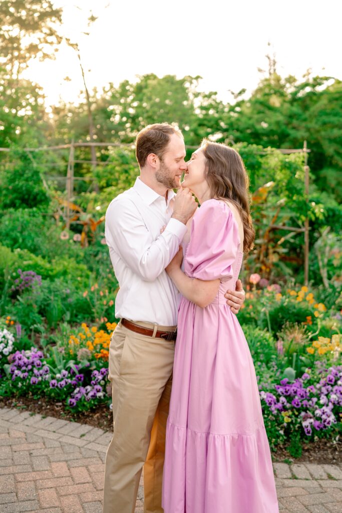 A couple sharing a kiss for their Green Spring Gardens engagement photos