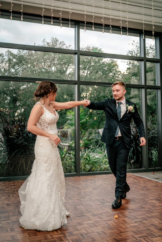A bride and groom sharing their first dance for their Virginia wedding photographer