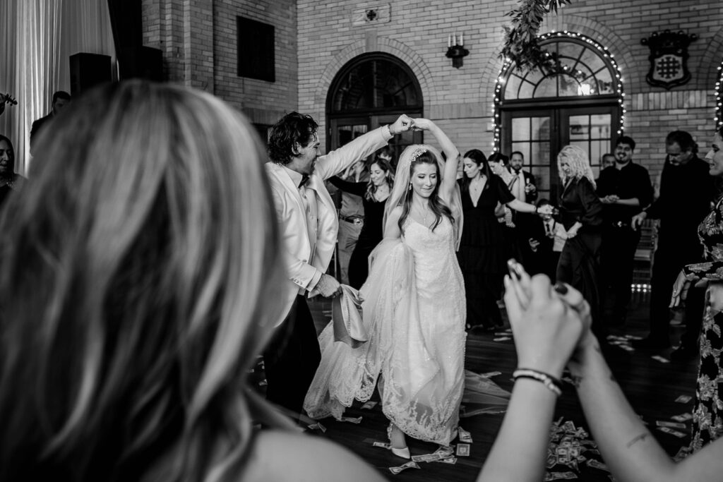 A bride and groom dancing together during their winter wedding in DC