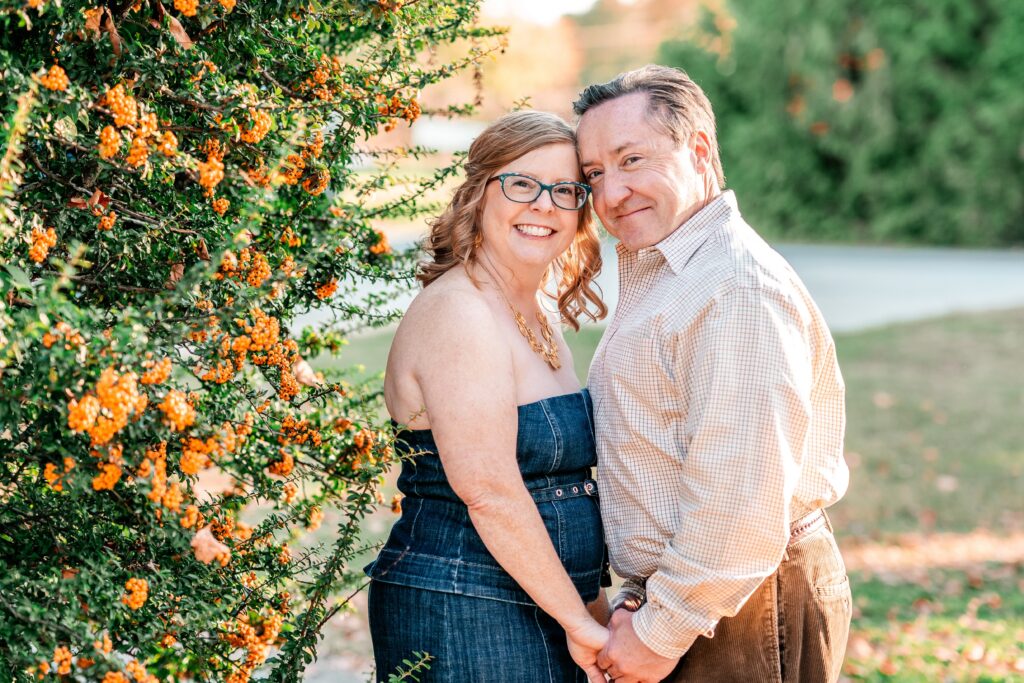 A couple smiling at the camera for Maryland engagement photos