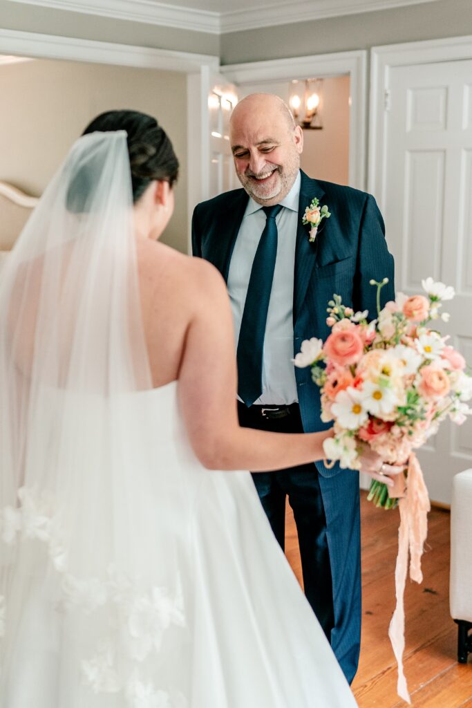 A father daughter first look before a St. Francis de Sales wedding
