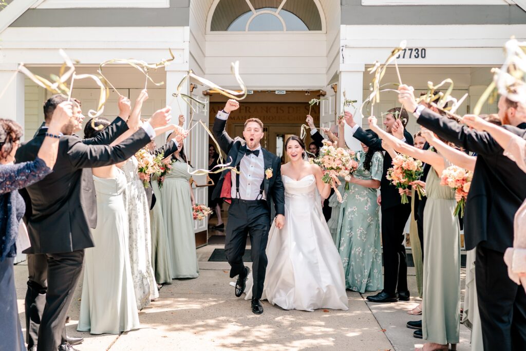 A ribbon exit from a St. Francis de Sales wedding