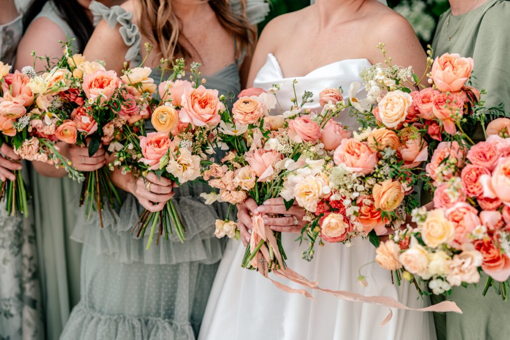 Peachy floral bouquets for a Shadow Creek wedding party