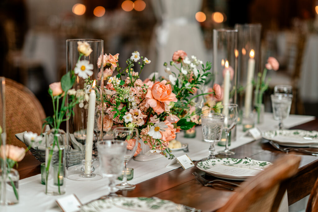 A Shadow Creek wedding reception detail photo of colorful floral centerpieces