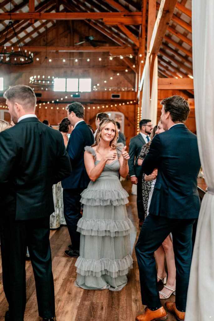 Candid guests at a Loudoun County wedding barn reception