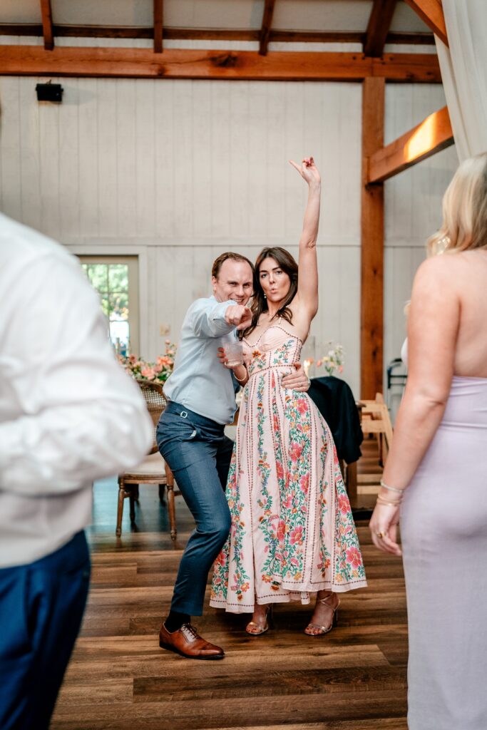 Wedding guests having fun on the dance floor