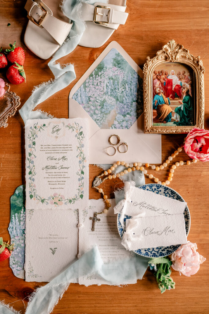Monet-inspired wedding vintations with wooden accents for a tea party wedding