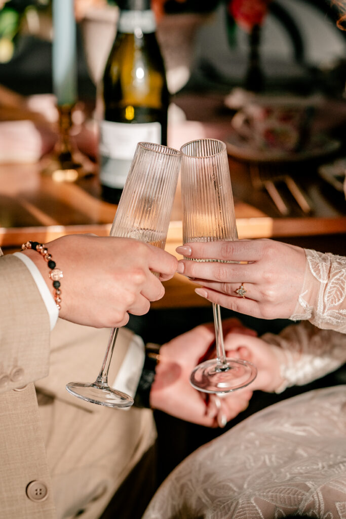 A champagne toast at a tea party wedding reception