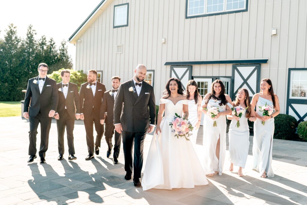 A wedding party walking toward the camera on a Loudoun County wedding day