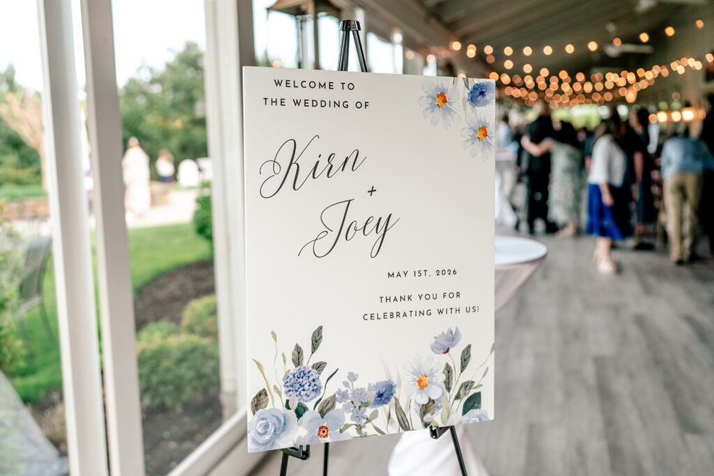 A wedding welcome sign that says Welcome to the wedding of Kirn and Joey
