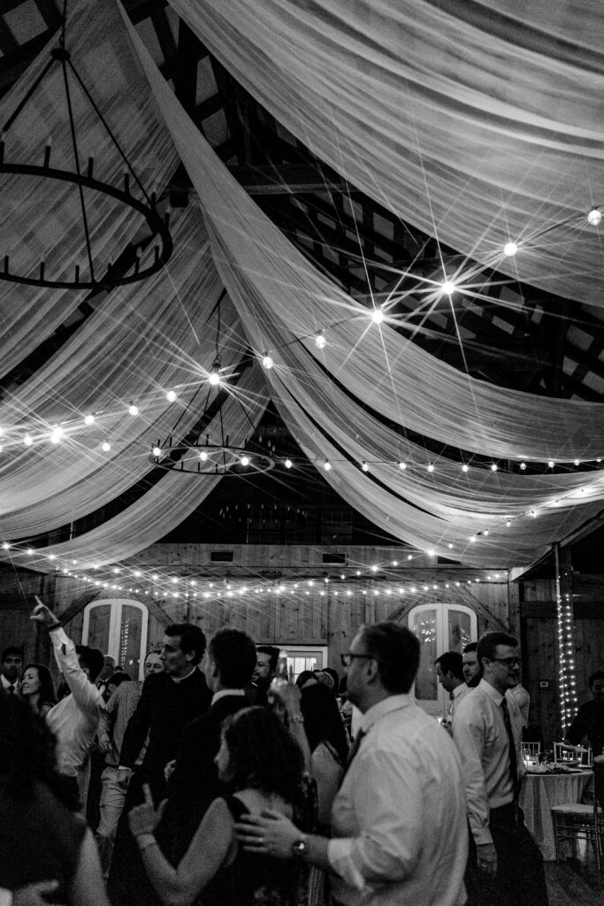 String lights overhead at a Loudoun County wedding reception